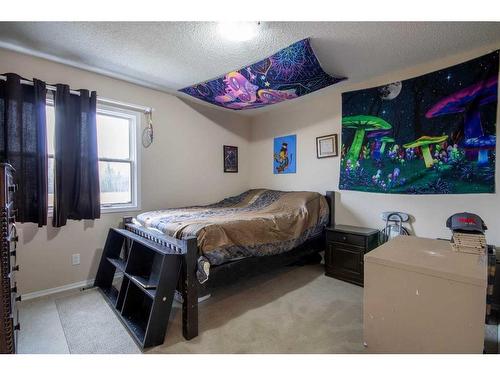 32169 Highway 760, Rural Mountain View County, AB - Indoor Photo Showing Bedroom