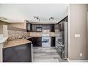 96 Saddlebrook Circle Ne, Calgary, AB  - Indoor Photo Showing Kitchen With Double Sink 