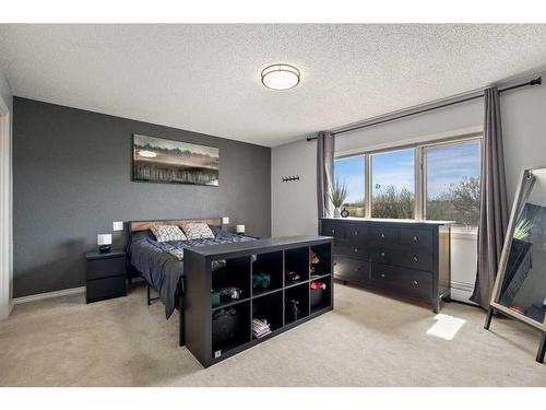 285223 Rr11, Crossfield, AB - Indoor Photo Showing Bedroom
