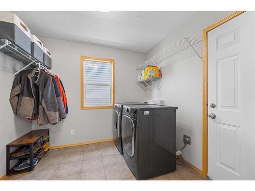 63 Brightondale Close Se, Calgary, AB - Indoor Photo Showing Laundry Room