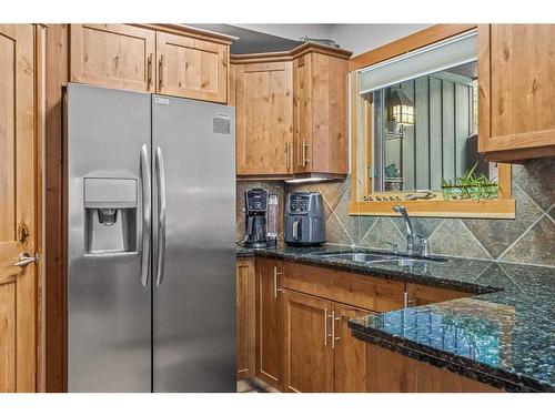 622-107 Armstrong Place, Canmore, AB - Indoor Photo Showing Kitchen With Double Sink