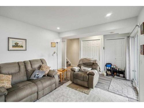 67 Coville Close Ne, Calgary, AB - Indoor Photo Showing Living Room