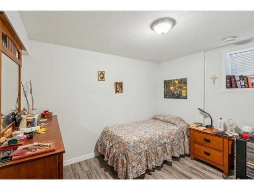 67 Coville Close Ne, Calgary, AB - Indoor Photo Showing Bedroom