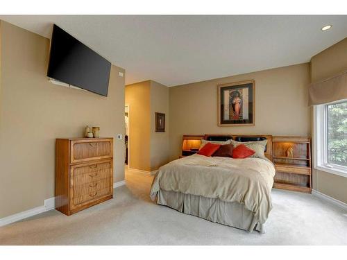 23 Prominence Point Sw, Calgary, AB - Indoor Photo Showing Bedroom