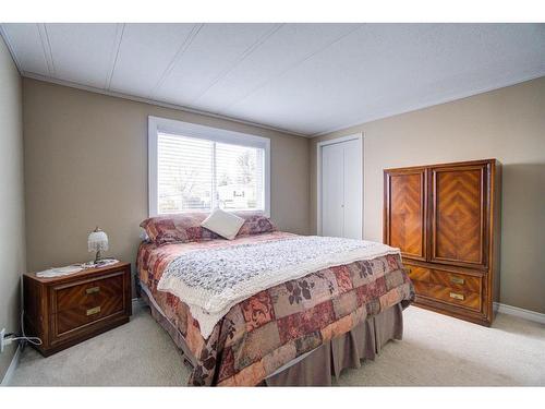 70 Westover Avenue, Claresholm, AB - Indoor Photo Showing Bedroom