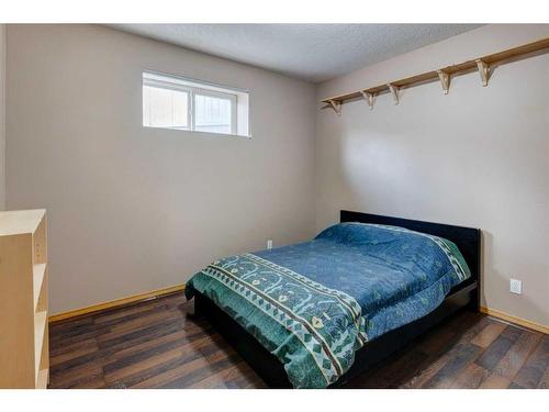 115 Bow Ridge Crescent, Cochrane, AB - Indoor Photo Showing Bedroom
