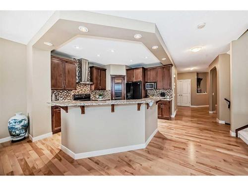 347 Silverado Boulevard Sw, Calgary, AB - Indoor Photo Showing Kitchen With Upgraded Kitchen