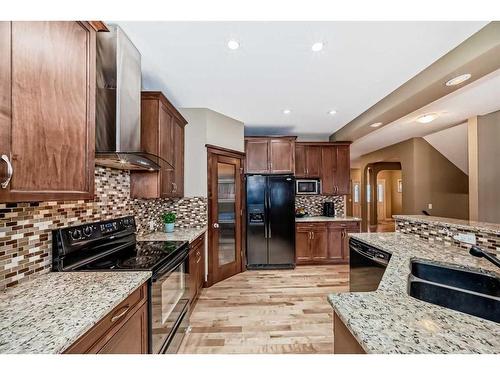 347 Silverado Boulevard Sw, Calgary, AB - Indoor Photo Showing Kitchen With Double Sink With Upgraded Kitchen