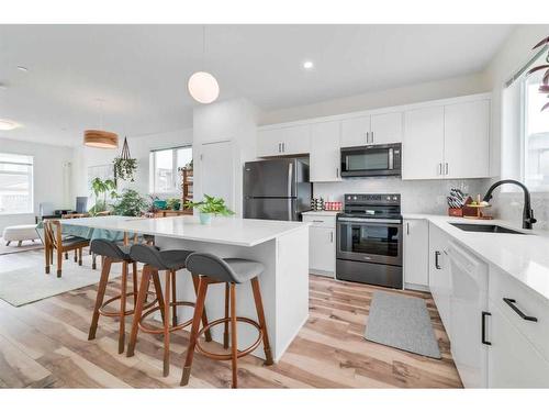 1437 Livingston Way Ne, Calgary, AB - Indoor Photo Showing Kitchen With Upgraded Kitchen