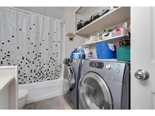1239 Downie Street, Carstairs, AB - Indoor Photo Showing Laundry Room