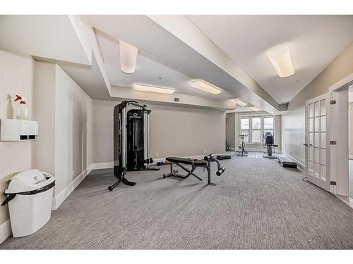 205-88 Arbour Lake Road Nw, Calgary, AB - Indoor Photo Showing Gym Room