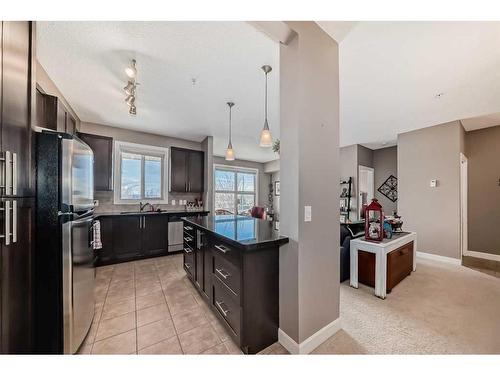 205-88 Arbour Lake Road Nw, Calgary, AB - Indoor Photo Showing Kitchen With Upgraded Kitchen