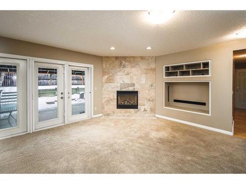 5047 Norris Road Nw, Calgary, AB - Indoor With Fireplace