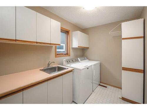 5047 Norris Road Nw, Calgary, AB - Indoor Photo Showing Laundry Room