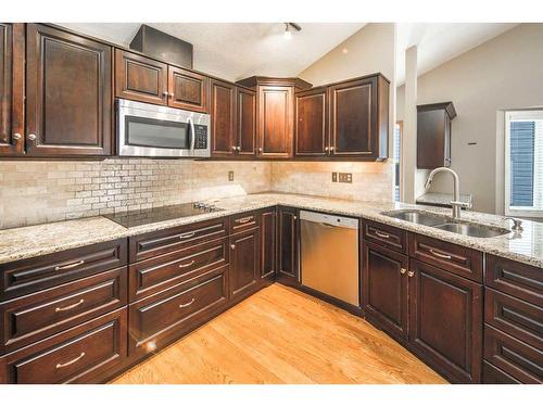 5047 Norris Road Nw, Calgary, AB - Indoor Photo Showing Kitchen With Double Sink