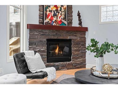 2518 7 Avenue Nw, Calgary, AB - Indoor Photo Showing Living Room With Fireplace