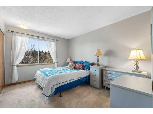 27 Strabane Place Sw, Calgary, AB - Indoor Photo Showing Bedroom