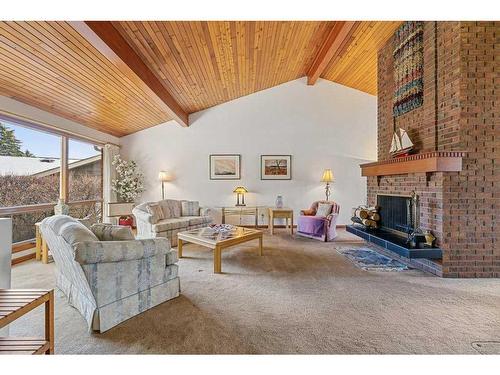 27 Strabane Place Sw, Calgary, AB -  Photo Showing Living Room With Fireplace