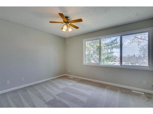 655 Woodpark Boulevard Sw, Calgary, AB - Indoor Photo Showing Other Room