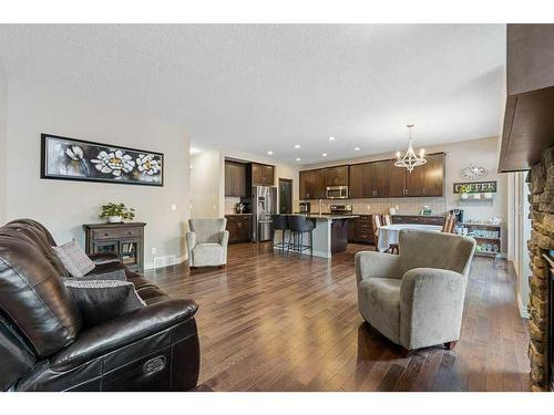 456 Mahogany Boulevard Se, Calgary, AB - Indoor Photo Showing Living Room With Fireplace