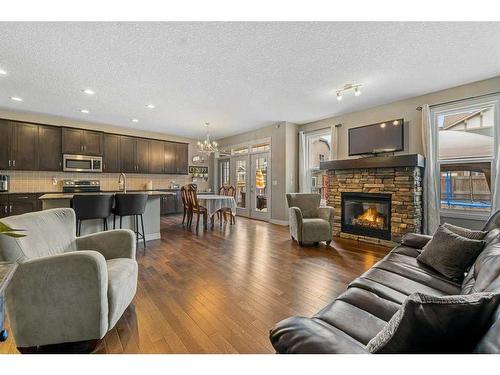456 Mahogany Boulevard Se, Calgary, AB - Indoor Photo Showing Living Room With Fireplace