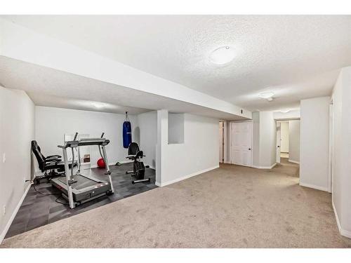8315 Addison Drive Se, Calgary, AB - Indoor Photo Showing Gym Room