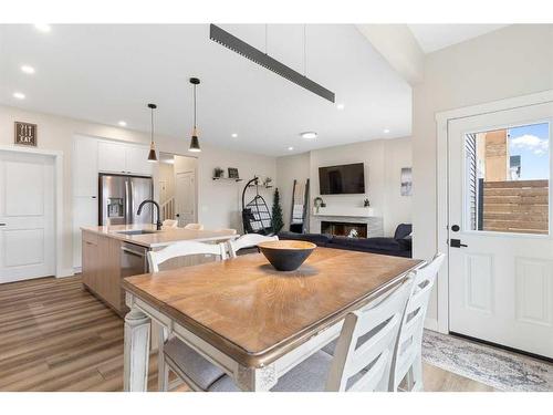 40 Emberside Green, Cochrane, AB - Indoor Photo Showing Kitchen With Upgraded Kitchen