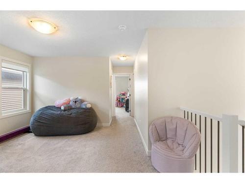 40 Emberside Green, Cochrane, AB - Indoor Photo Showing Bedroom