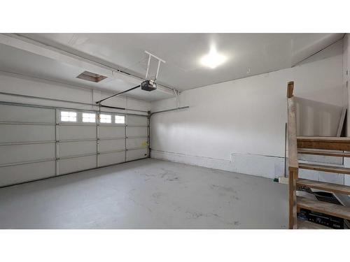102 Somercrest Circle Sw, Calgary, AB - Indoor Photo Showing Garage