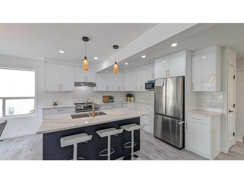 102 Somercrest Circle Sw, Calgary, AB - Indoor Photo Showing Kitchen With Stainless Steel Kitchen With Upgraded Kitchen