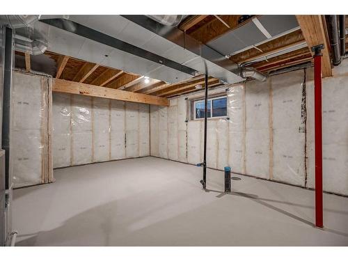 134 Alpine Drive Sw, Calgary, AB - Indoor Photo Showing Basement