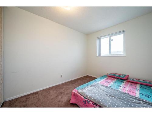 85 Martinbrook Road Ne, Calgary, AB - Indoor Photo Showing Bedroom