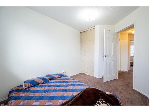 85 Martinbrook Road Ne, Calgary, AB - Indoor Photo Showing Bedroom