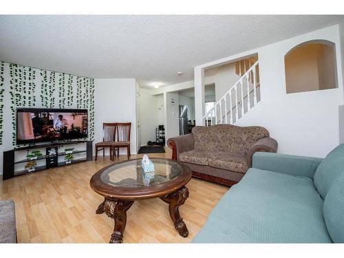 85 Martinbrook Road Ne, Calgary, AB - Indoor Photo Showing Living Room