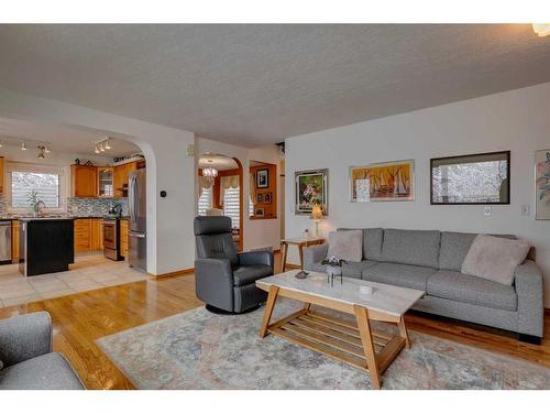106 Arbour Ridge Heights Nw, Calgary, AB - Indoor Photo Showing Living Room