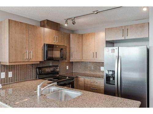 1306-210 15 Avenue Se, Calgary, AB - Indoor Photo Showing Kitchen With Double Sink With Upgraded Kitchen