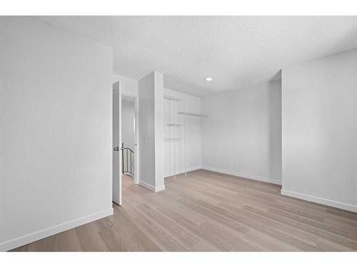 411-2520 Palliser Drive Sw, Calgary, AB - Indoor Photo Showing Other Room