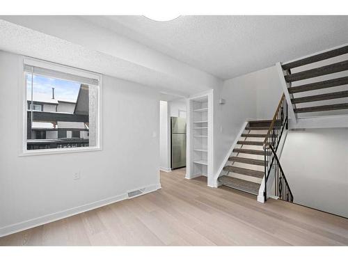 411-2520 Palliser Drive Sw, Calgary, AB - Indoor Photo Showing Other Room