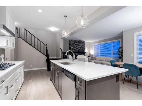 242 West Grove Point Sw, Calgary, AB - Indoor Photo Showing Kitchen With Double Sink