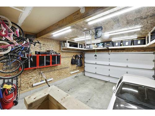 64 Reunion Close Nw, Airdrie, AB - Indoor Photo Showing Garage