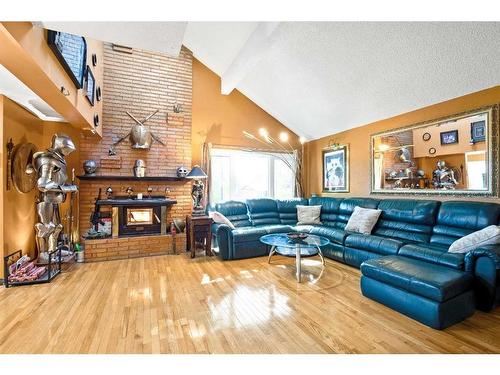 459 Cantrell Drive Sw, Calgary, AB - Indoor Photo Showing Living Room With Fireplace
