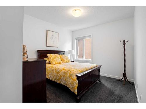 663 Cranston Avenue Se, Calgary, AB - Indoor Photo Showing Bedroom
