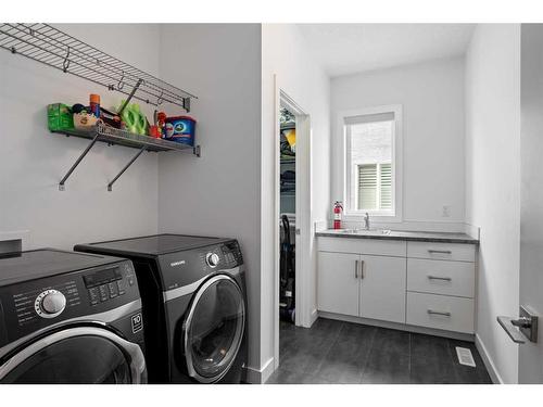 663 Cranston Avenue Se, Calgary, AB - Indoor Photo Showing Laundry Room
