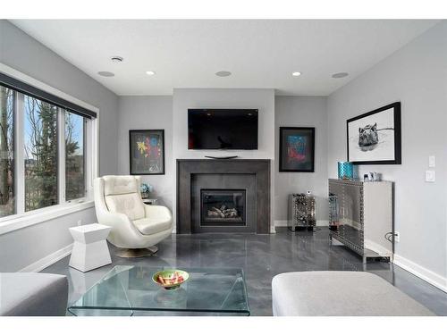 663 Cranston Avenue Se, Calgary, AB - Indoor Photo Showing Living Room With Fireplace