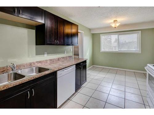 1183 Marcombe Crescent Ne, Calgary, AB - Indoor Photo Showing Kitchen With Double Sink