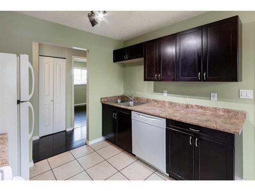 1183 Marcombe Crescent Ne, Calgary, AB - Indoor Photo Showing Kitchen With Double Sink