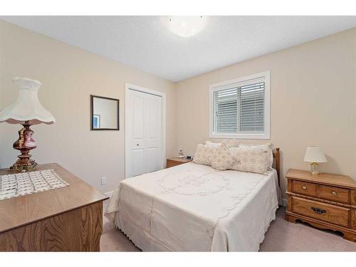 21 Legacy Gate Se, Calgary, AB - Indoor Photo Showing Bedroom