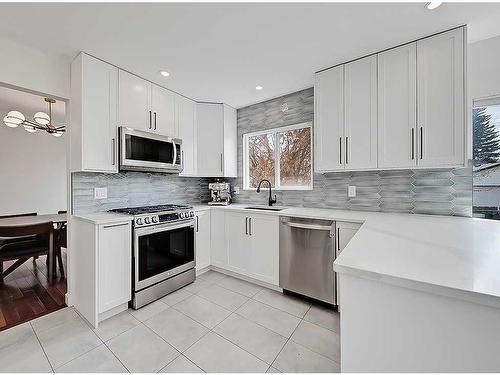 127 Silver Ridge Close Nw, Calgary, AB - Indoor Photo Showing Kitchen With Stainless Steel Kitchen With Upgraded Kitchen