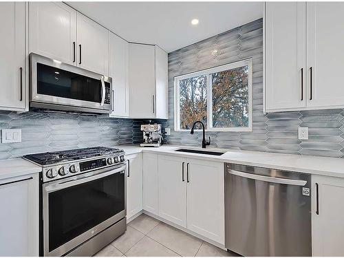 127 Silver Ridge Close Nw, Calgary, AB - Indoor Photo Showing Kitchen With Stainless Steel Kitchen With Upgraded Kitchen