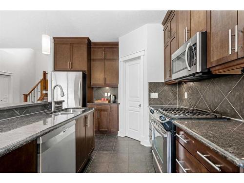 90 Royal Oak Drive Nw, Calgary, AB - Indoor Photo Showing Kitchen With Double Sink With Upgraded Kitchen